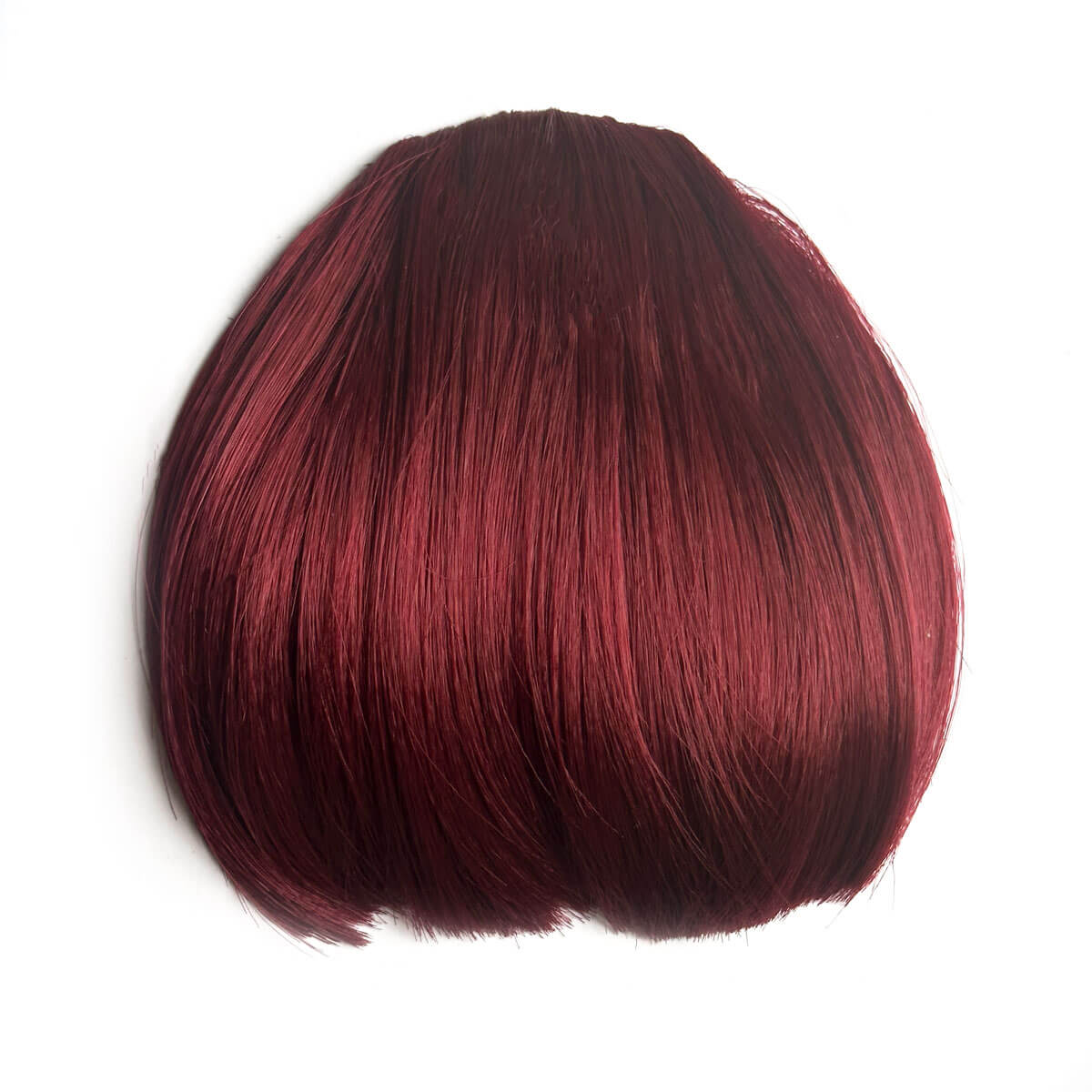 Red hair extension on a white background. Clip-in fringe hairpiece/clip-in micro-bangs, thick, straight retro rockabilly style: Ida cherry red 39