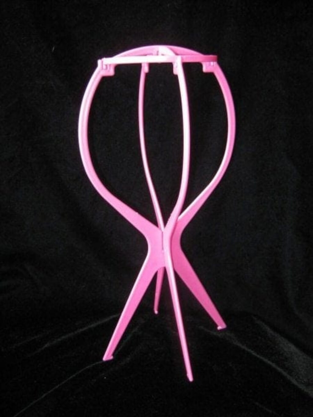 A collapsible wig stand - pink