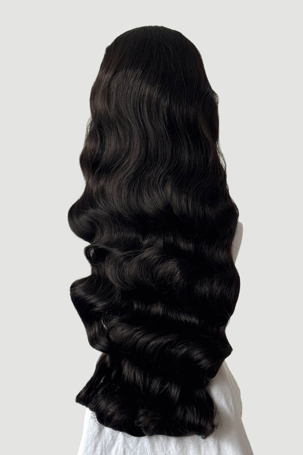 Mannequin head with long, dark brown hair styled in a ponytail on a plain background. Ultra long half wig with hollywood waves. dark brown 4