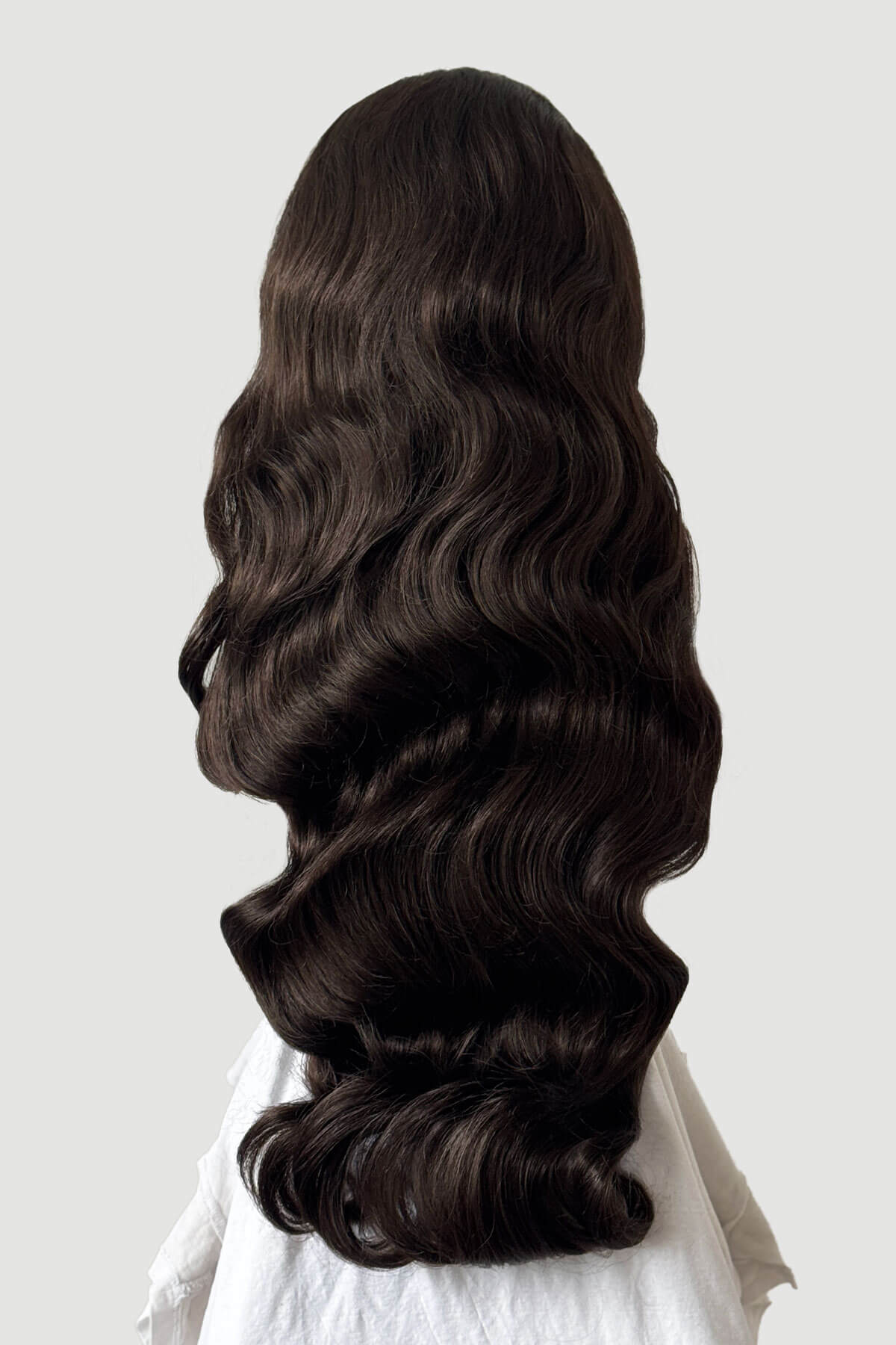 Mannequin head with long, brown hair styled in a ponytail on a plain background. Ultra long half wig with hollywood waves. chestnut brown 8