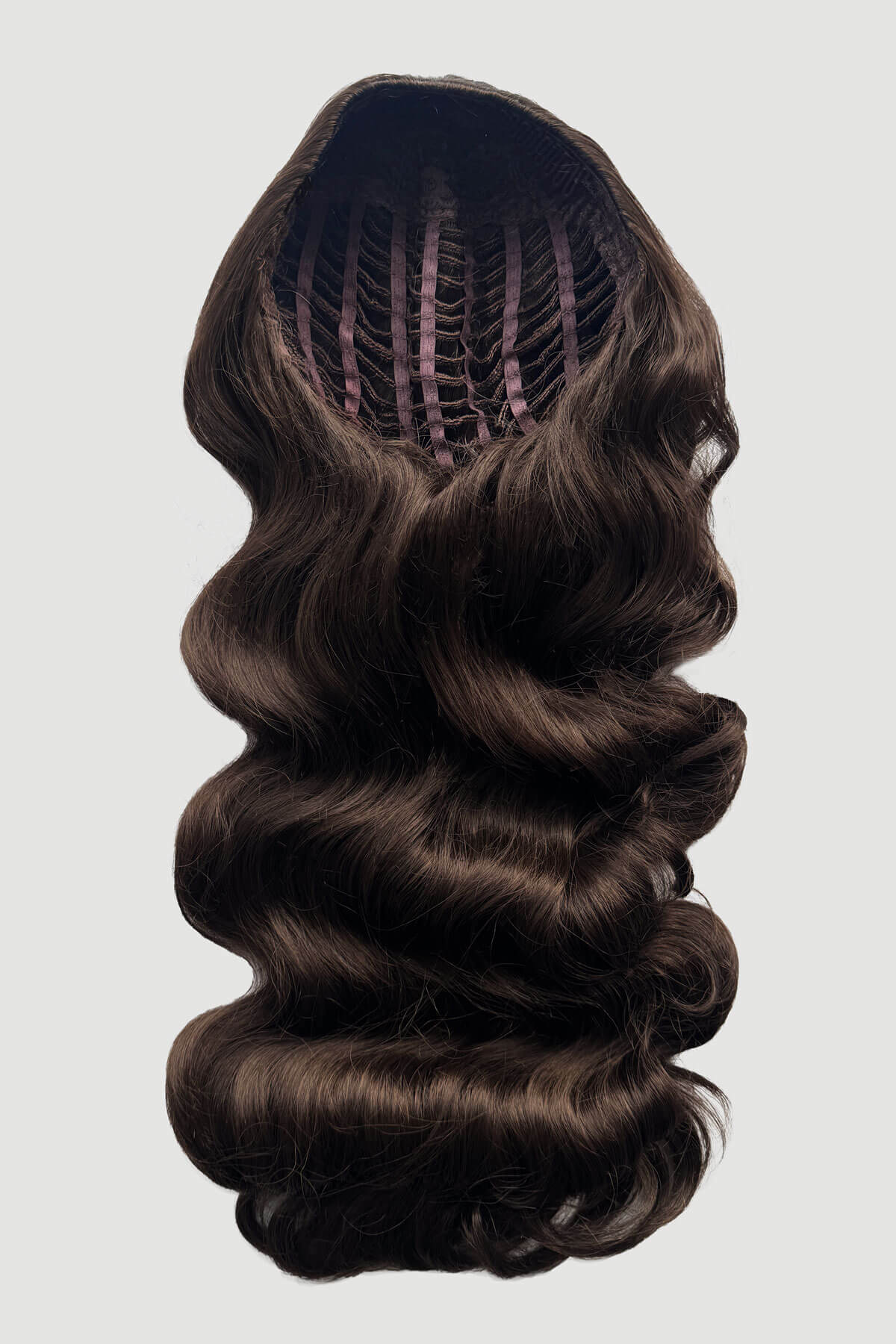 Mannequin head with long, brown hair styled in a ponytail on a plain background. Ultra long half wig with hollywood waves. chestnut brown 8
