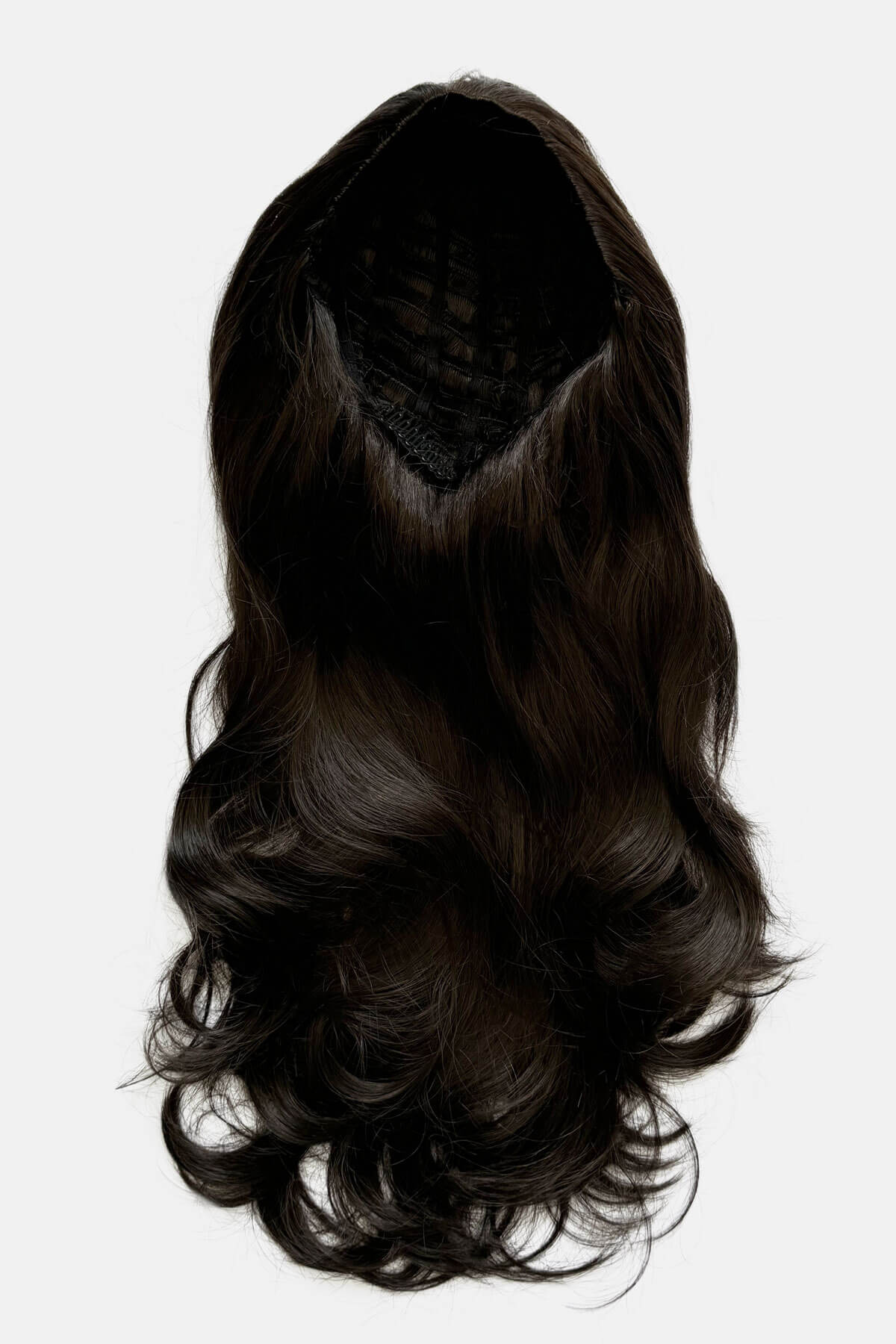 Black hair extension on a white background. Brown half wig hairpiece (3/4 wig), layered, wavy: Simone dark brown 4