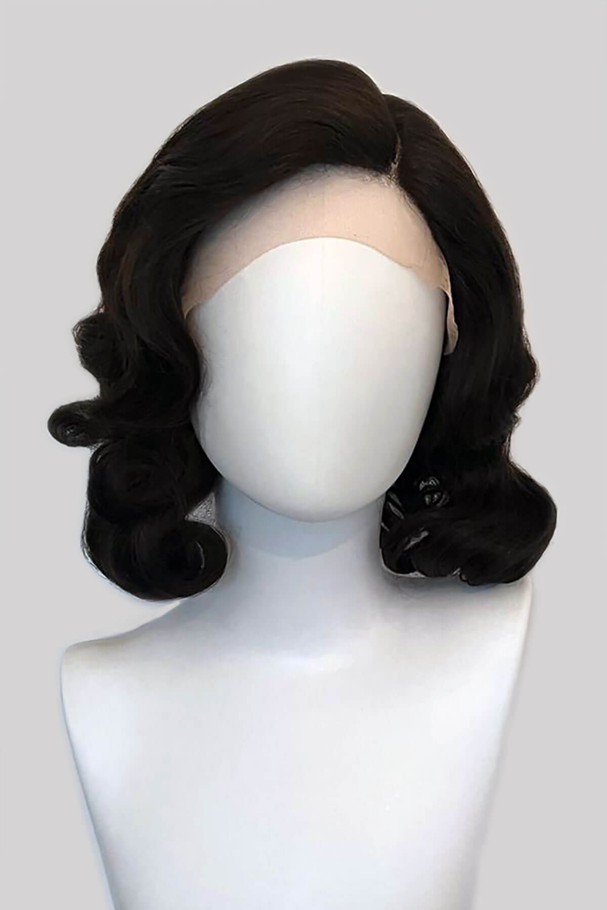 Black wig on a mannequin head against a white background. Brown lacefront wig, pinup/vintage style, mid length with finger waves: Agatha