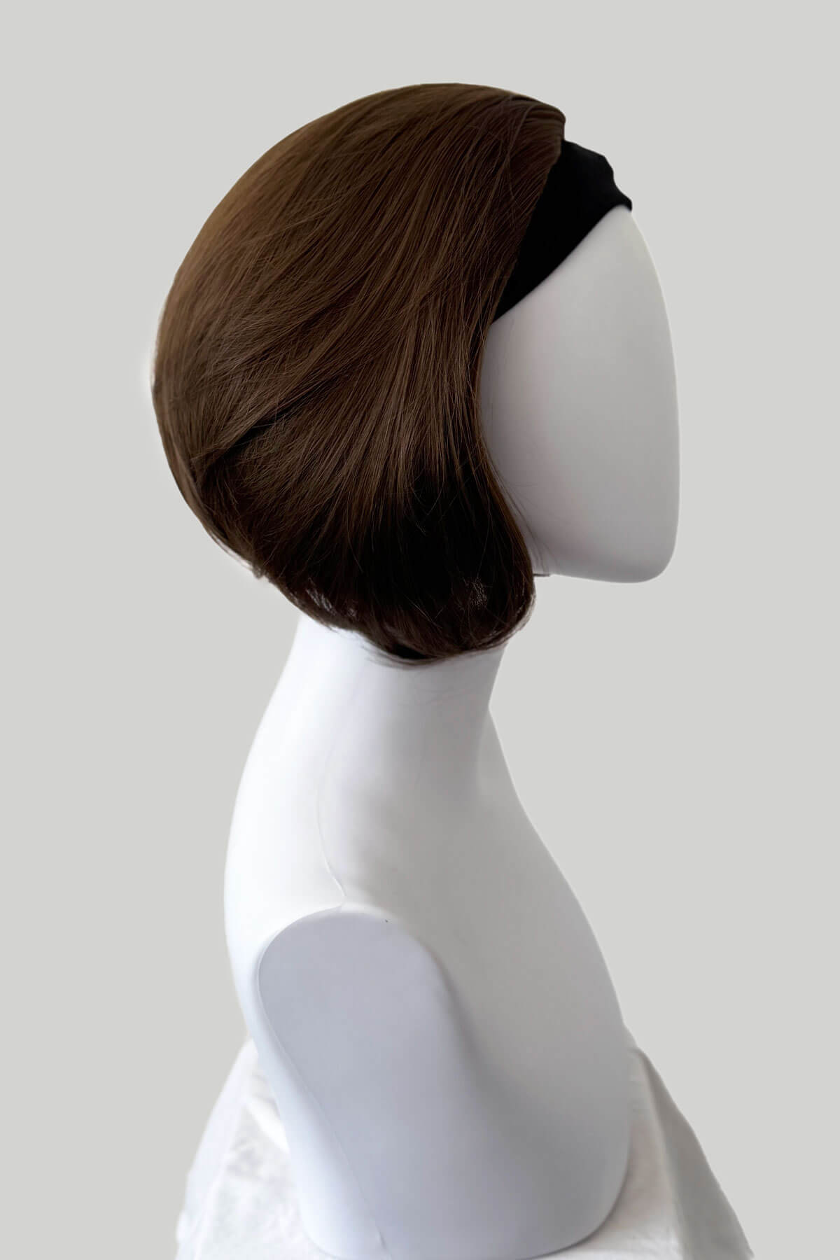 Brown wig on a mannequin head against a white background. Bob half wig hairpiece, Flexihair: Amelie chestnut brown 8