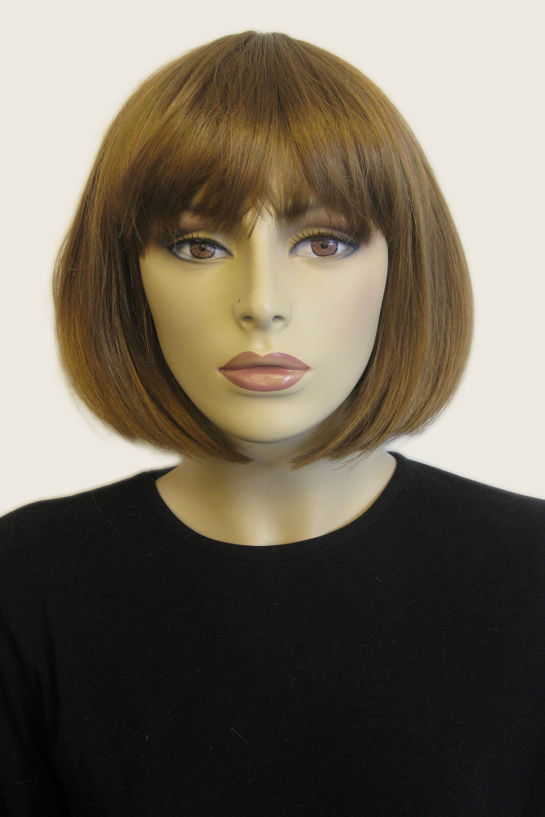 Mannequin head with a brown bob wig on a white background. Brown bob wig, chic and stylish: Honour light brown 27