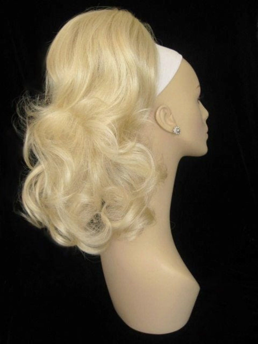 Curly ponytail extension clip-on hairpiece: Tulisa champagne blonde 613