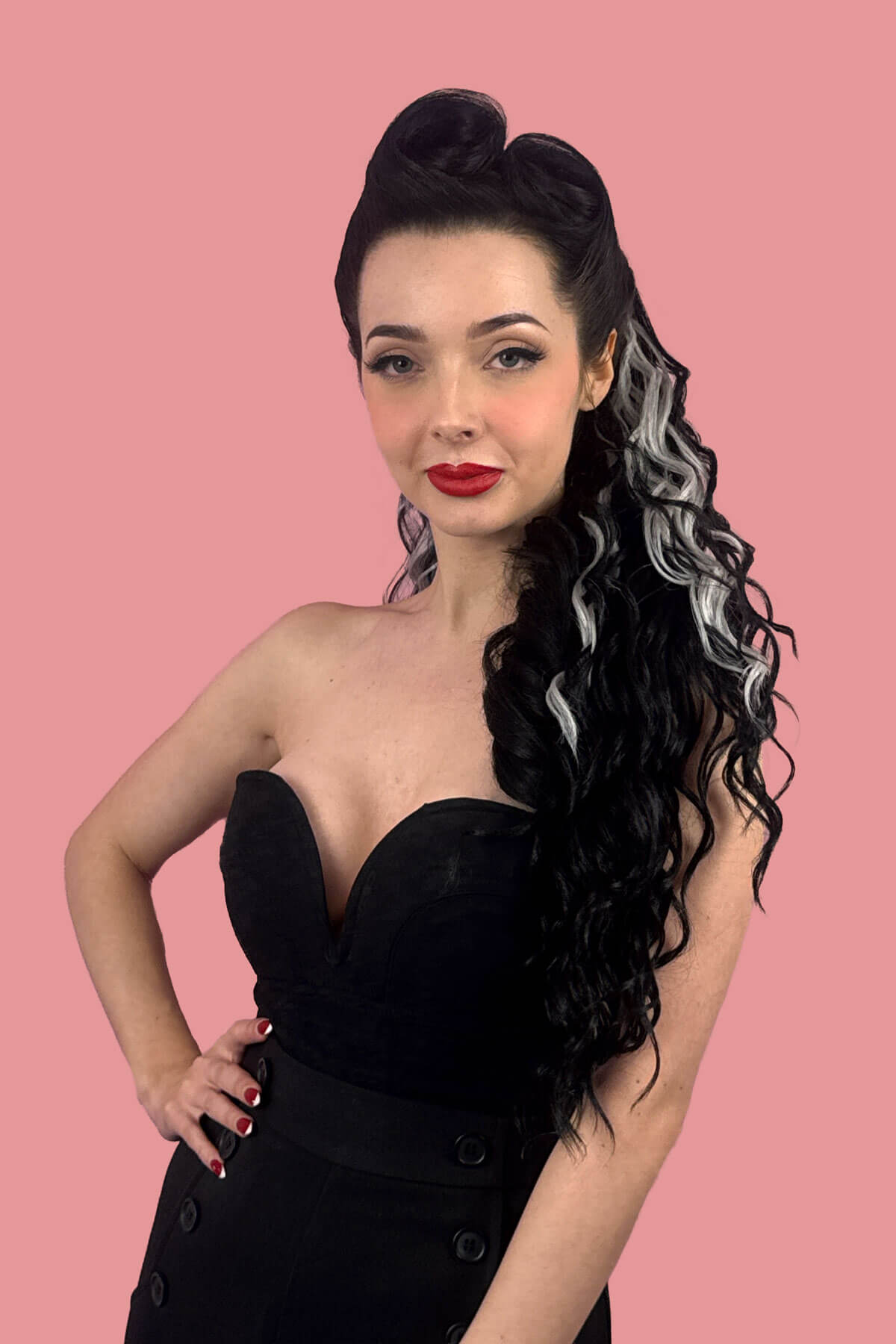 A woman in profile wearing a black strapless dress, showcasing a long, dark, curly wavy hair extension with grey streaks against a solid pink background. Long Curly Ponytail Hair Piece Extension, Black and Grey