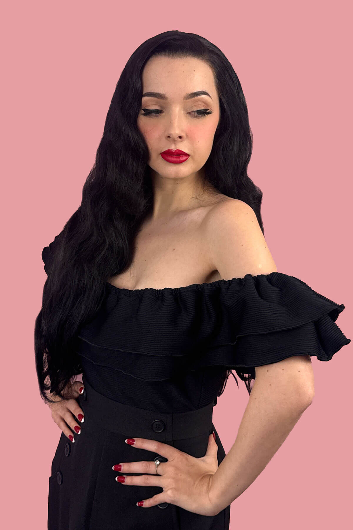 Woman with long. black curly hair. Black curly half wig hairpiece (volume wig), big loose curls: Suzie