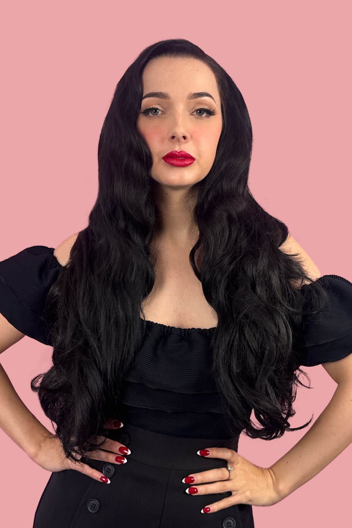 Woman with long. black curly hair. Black curly half wig hairpiece (volume wig), big loose curls: Suzie