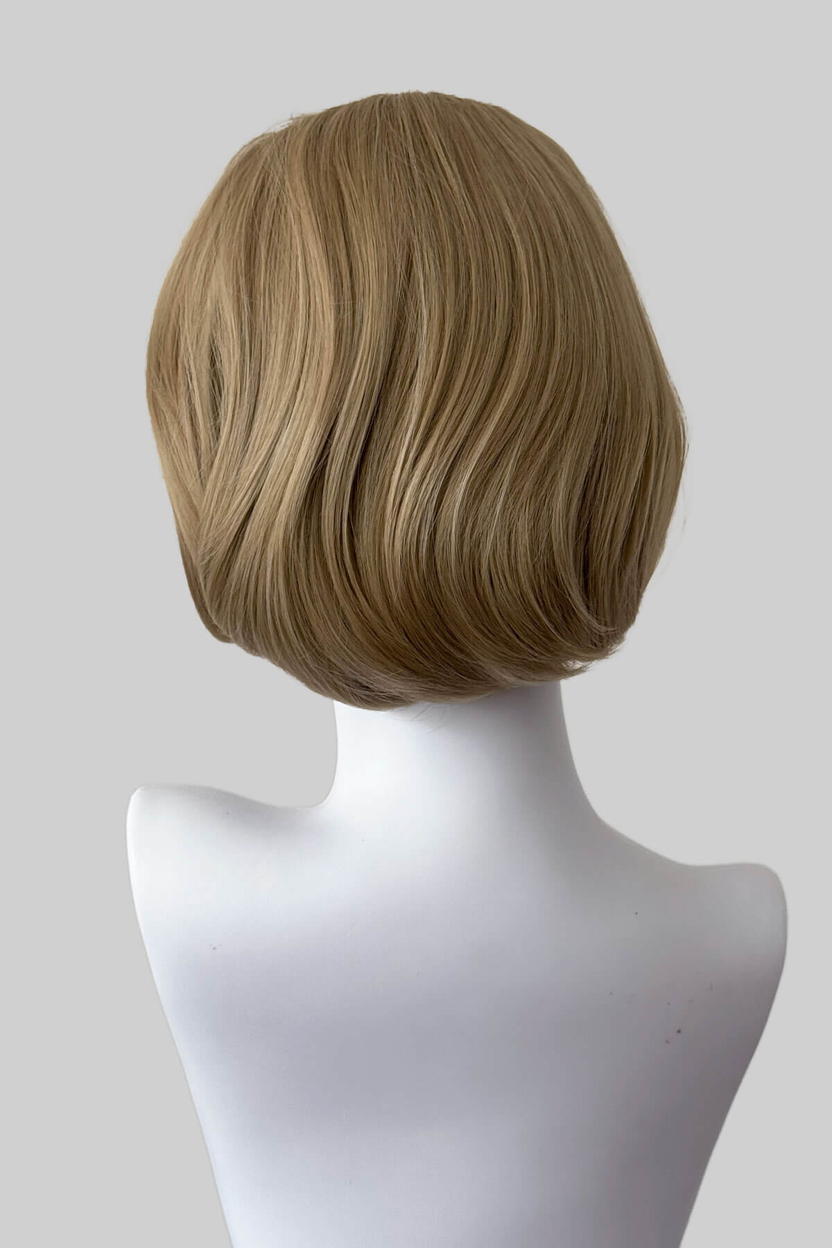 Mannequin head with a blonde wig on a plain background. Bob half wig hairpiece, Flexihair: Amelie blonde 24H613