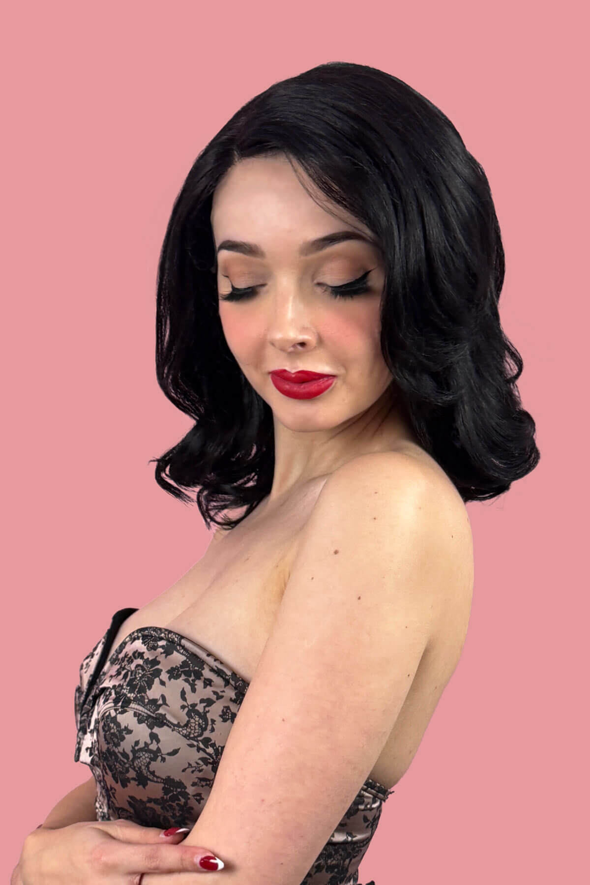 Woman with beautiful black hair. Black shoulder length long bob (lob) lace front wig with side sweeping fringe/bangs: Amaris