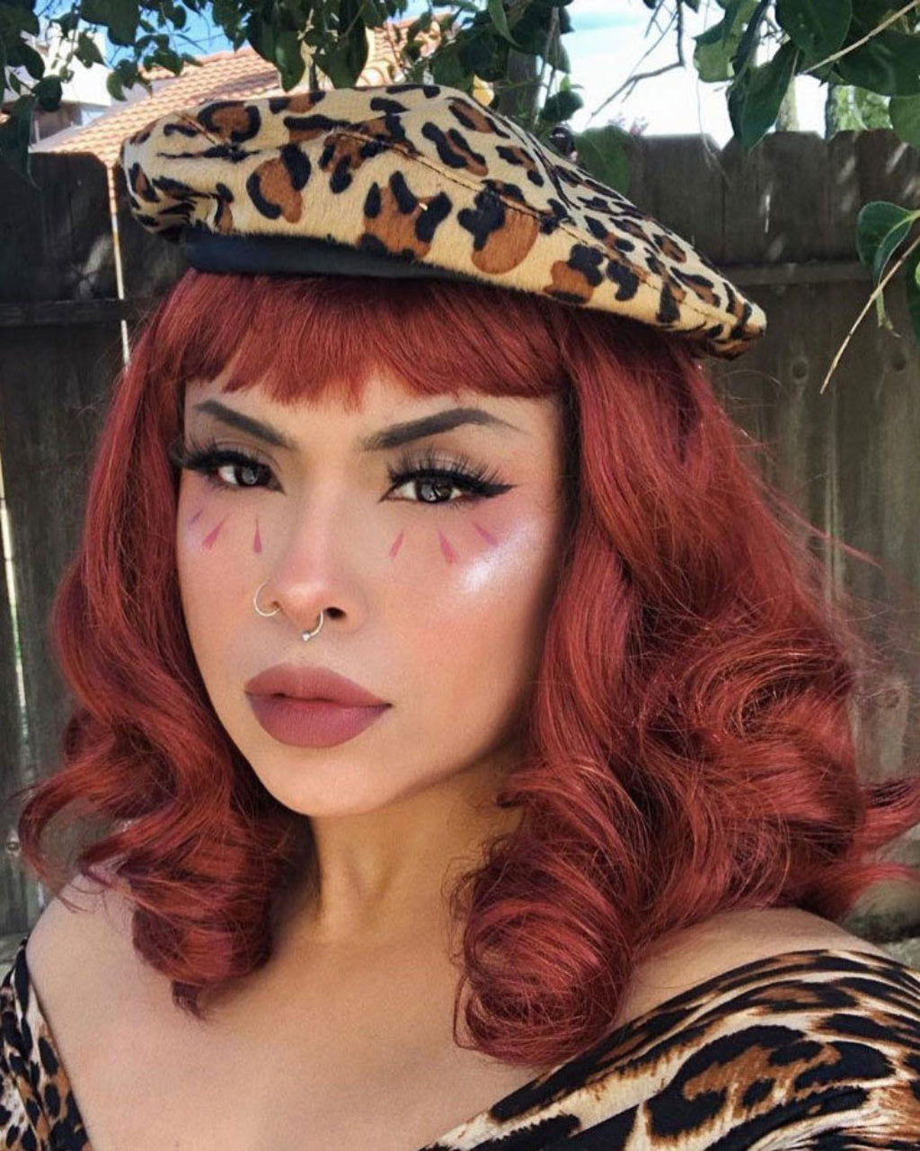 Copper red 1950s pinup wig, curled with short fringe: Kitty