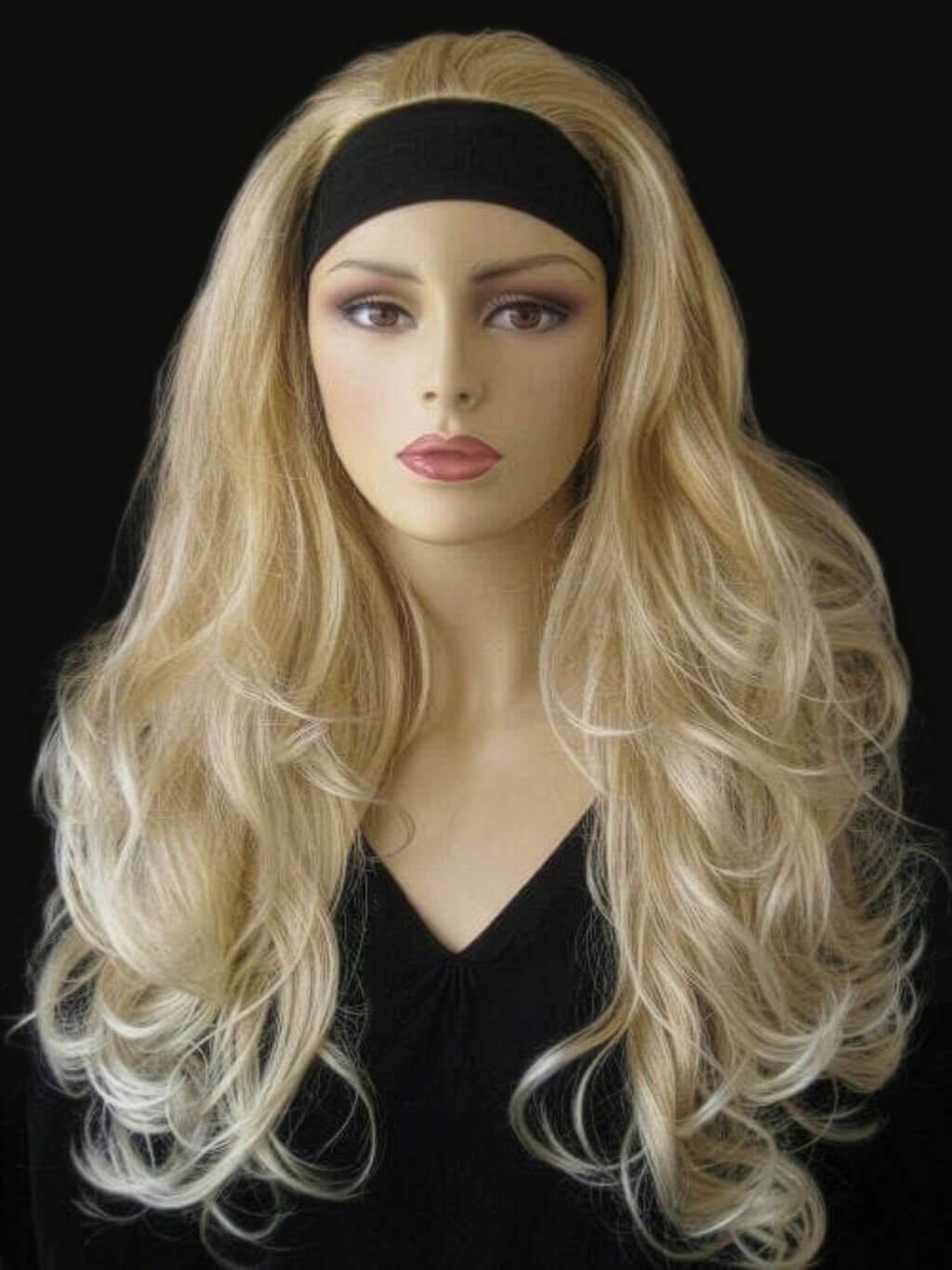 Mannequin head with long blonde wig and black headband on a black background. Long blonde 3/4 hairpiece (half wig), big loose curls: Zara blonde 24BT613