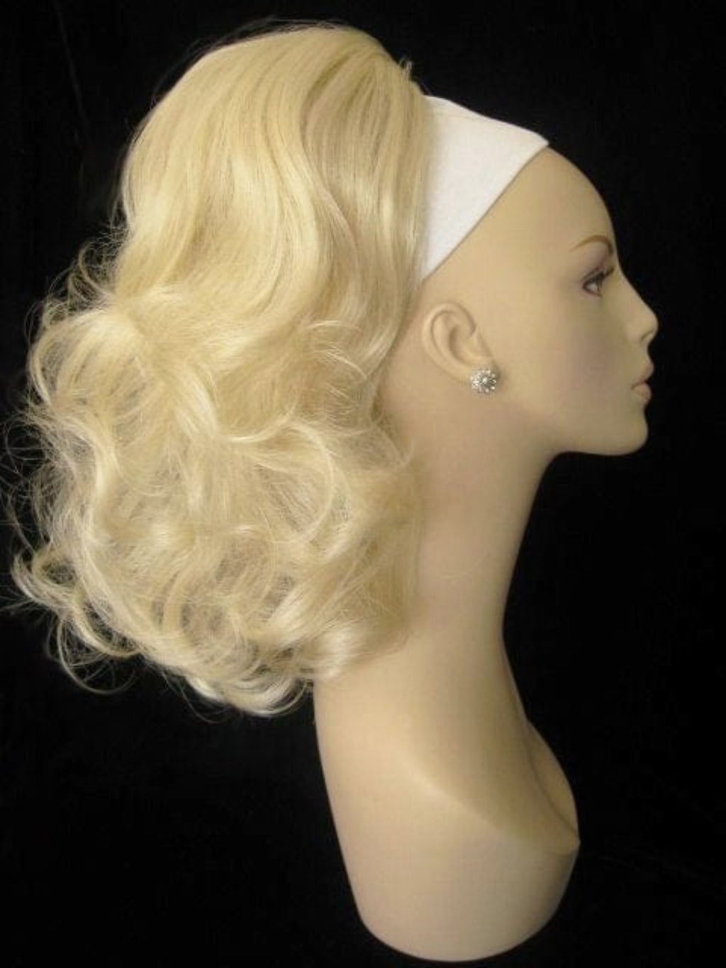 Curly ponytail extension clip-on hairpiece: Tulisa champagne blonde 613